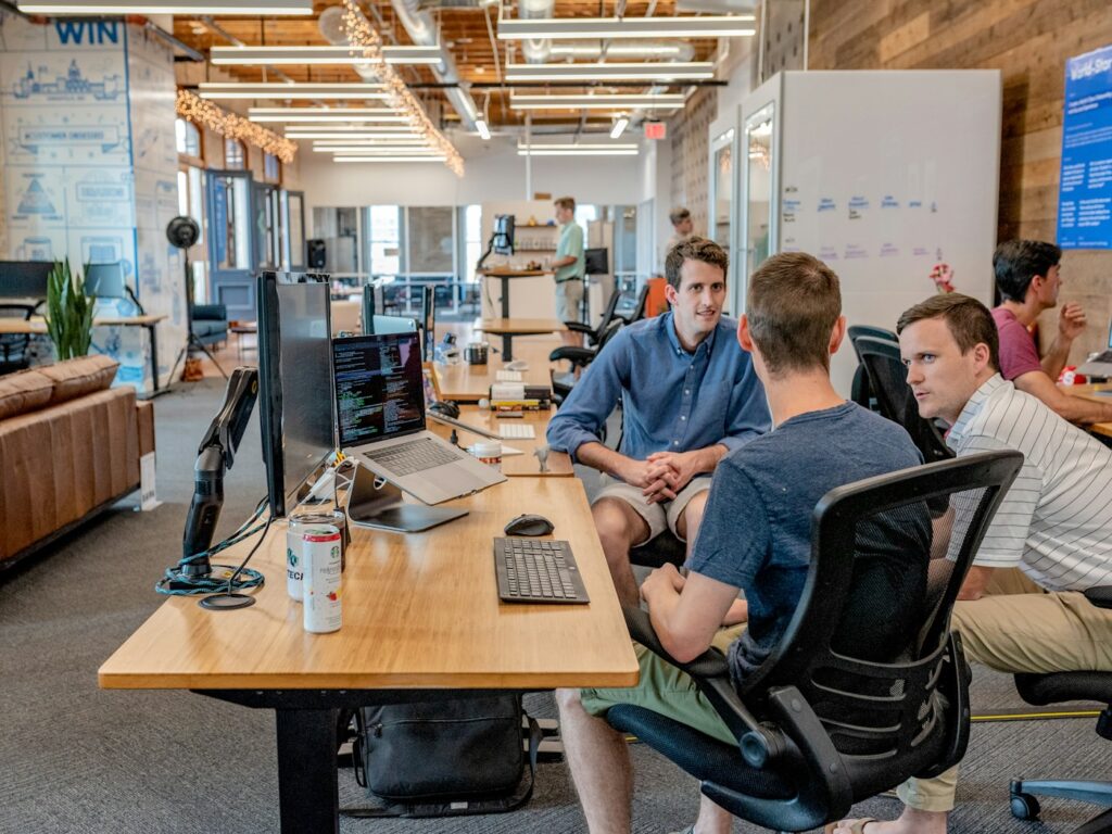 Team reviewing a clear decision agenda during a workplace meeting